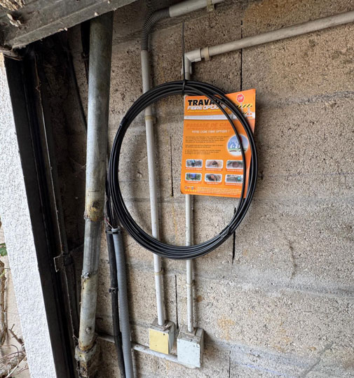 passage câble fibre optique